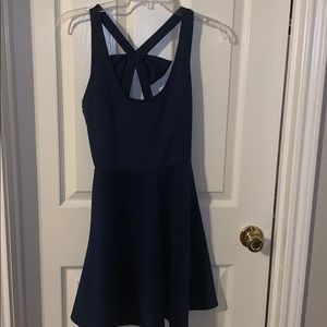 Navy mini dress with bow on back